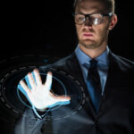 a man puts his palm on the scan